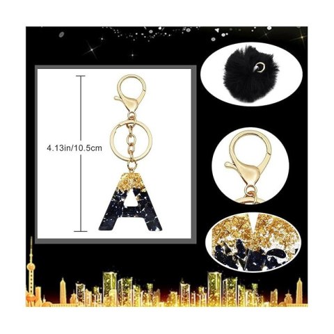 BRELOK DO KLUCZY LITERKA "J" CZARNO-ZŁOTA Z POMPONEM, ŻYWICA BRL342J