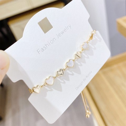 Bransoletka na rękę stal chirurgiczna pozłacana 14k złotem, SERCA masa perłowa BST1532