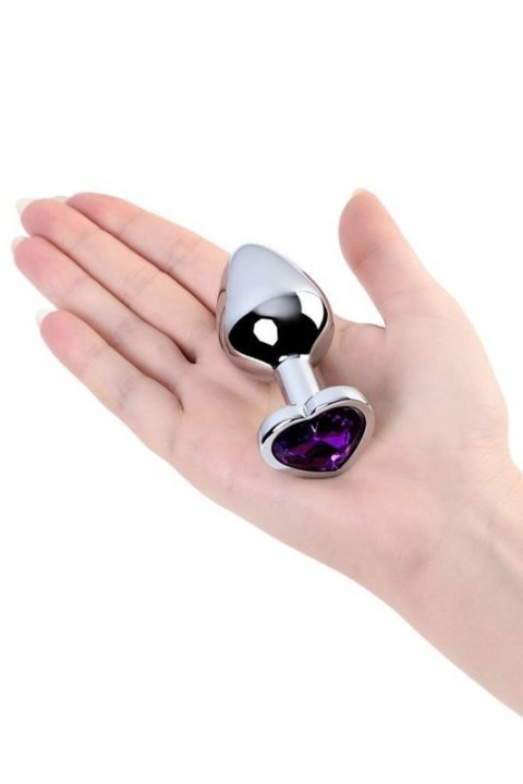 Silver anal plug with purple gem heart-shaped Silver anal plug with purple gem heart-shaped