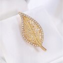 Broszka ozdobna - złoty liść z cyrkoniami BZ212